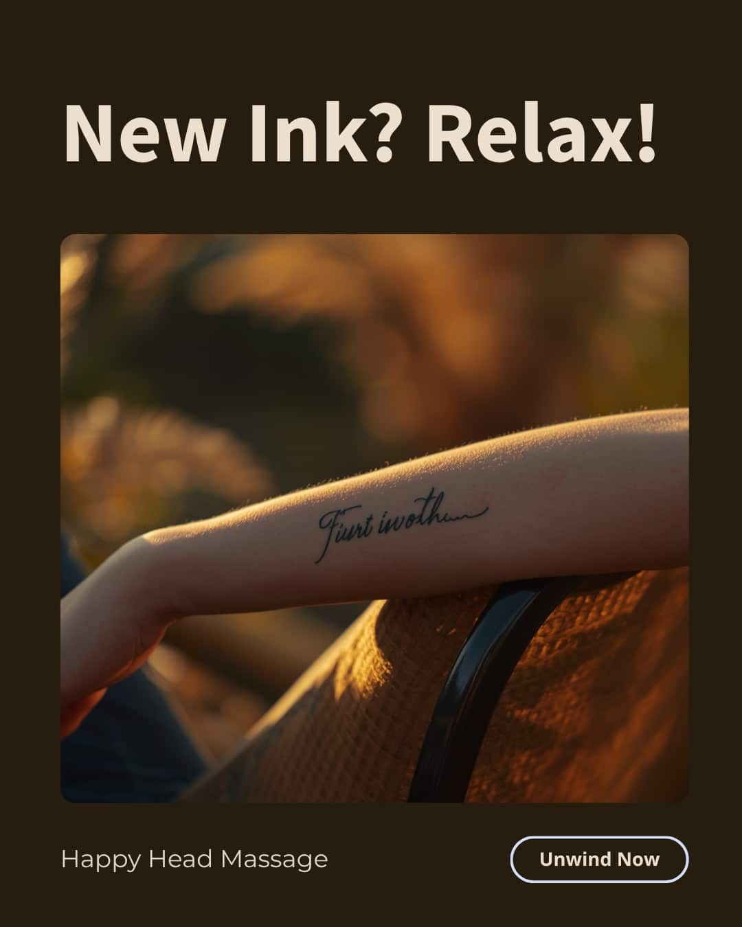 Tattooed forearm resting in warm golden-hour light — how soon to book a massage after a tattoo