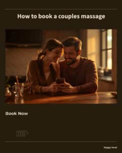 How to book a couples massage: a couple sitting together at a kitchen counter in warm light, looking at a phone to make a booking