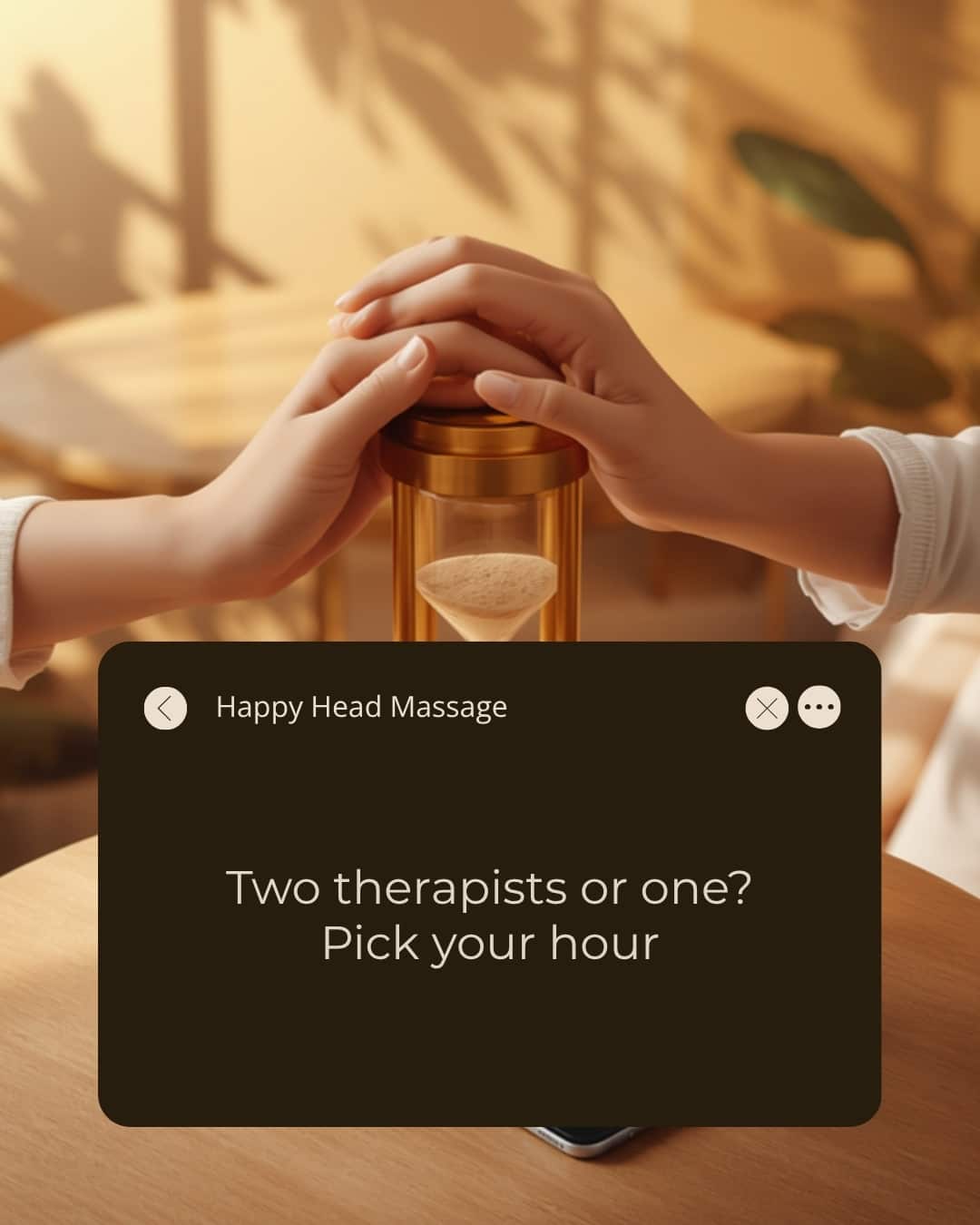 Two pairs of hands resting on a golden hourglass, illustrating 4 hand massage vs regular massage